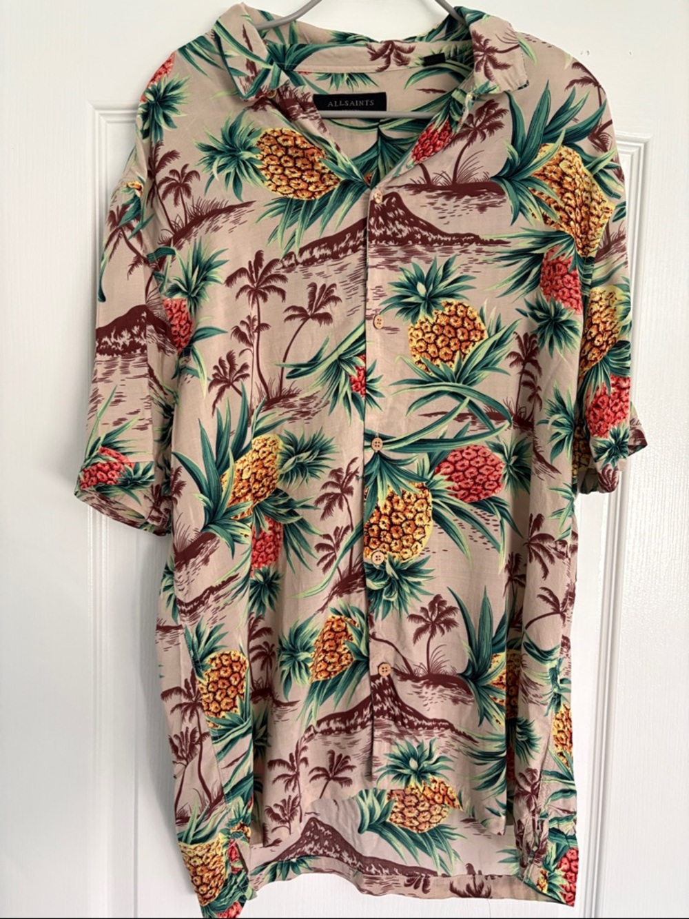 AllSaints Men’s Endeavour Hawaiian shirt 
with a tropical pineapple print.